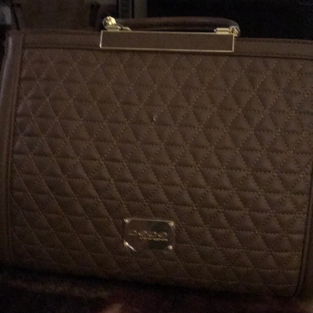 NWT BEBE shoulder bag. Comes with shoulder strap